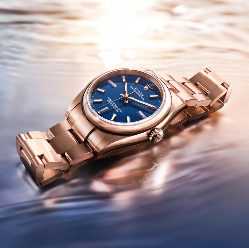 Rolex Oyster Perpetual 34 with a blue stone dial and Everose gold case and bracelet.